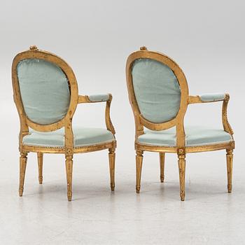 Karmstolar, ett par, samt soffa, Louis XVI-stil, omkring år 1900.