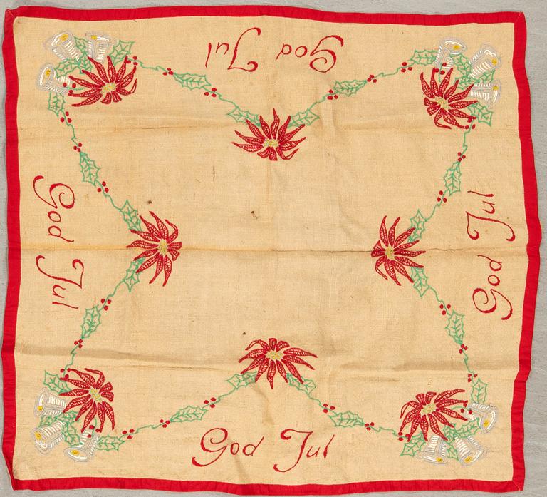 A collection of Christmas tablecloths, Christmas tree skirts, an apron, and runners, 21 pcs, 20th century.