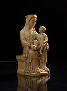 Virgin and Child, a French Gothic ivory statuette, second half of the 13th century.