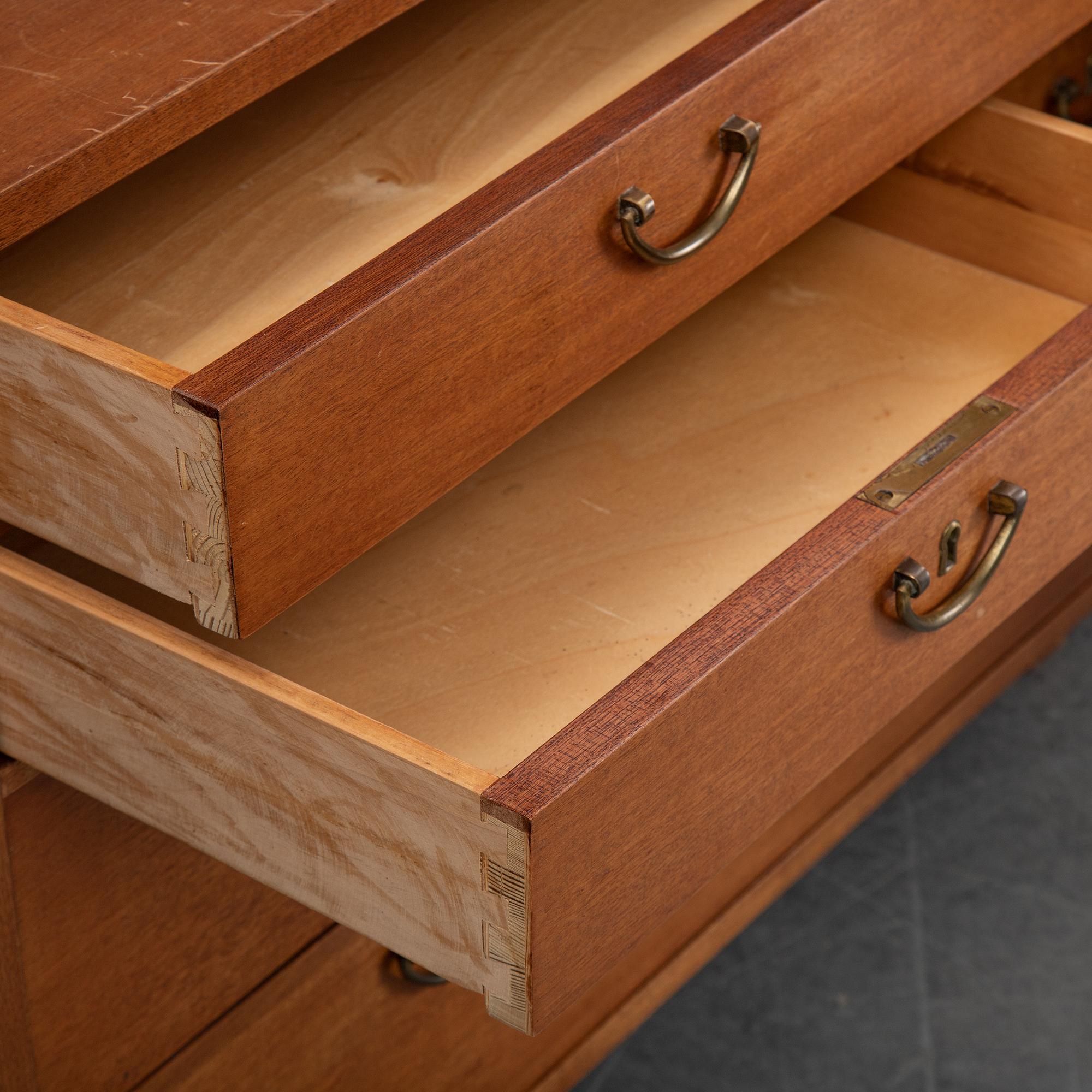 Josef Frank, a set of three mahogany bookcases, model 2112, Firma Svenskt Tenn.