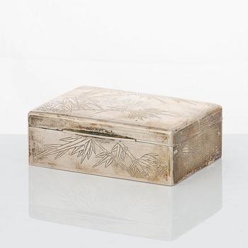 A set with 2 Chinese silver boxes, a coaster and a match stick holder, 20th Century.