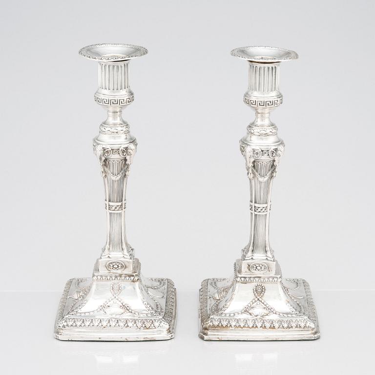 An English pair of 18th Century silver candlesticks, mark of John Winter & Co, Sheffield 1775.