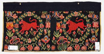 A cushion, 'Red Lion' (Rött Lejon), tapestry weave, c. 98 x 49 cm, Southwestern Scania, first part of the 19th century.