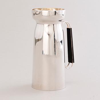 A 1960s silver jug with hardwood handle, Kultateollisuus, Turku Finland 1968.