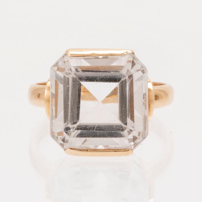 Ring och örhängen 18K guld samt fasettslipade bergskristaller.