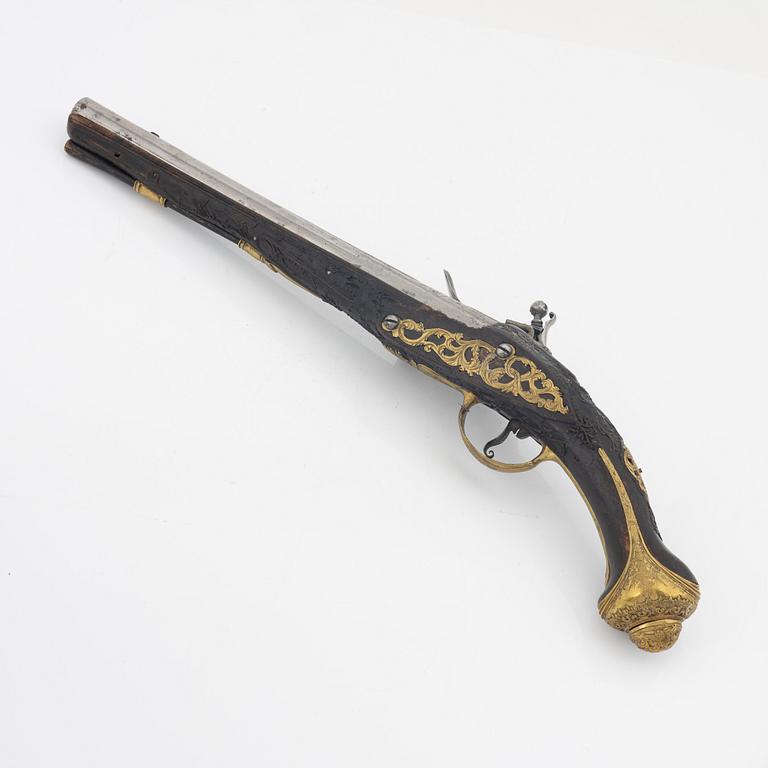 A flintlock pistol, 18th Century.