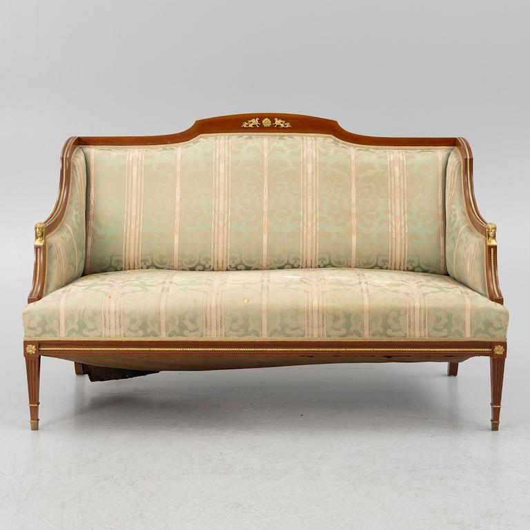 A sofa, two armchairs, four chairs and table, Empire style, 20th century.