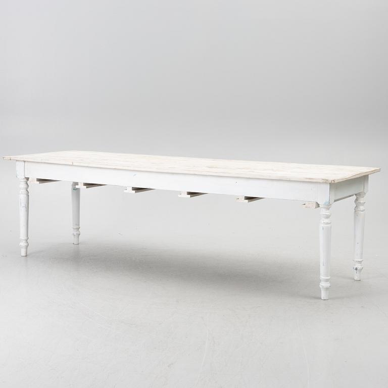 A table with stools, 20th/21st century.