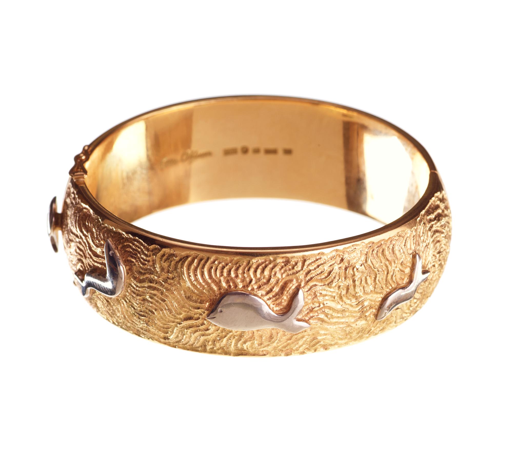 An Olle Ohlsson 18k gold bangle,