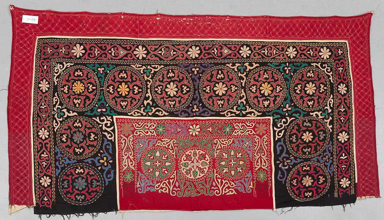 A Suzani textile, ca 247 x 128 cm.