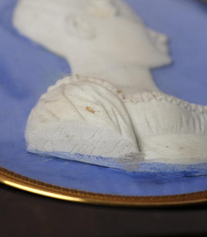 A pair of Sèvres biscuit plaques by Alexandre Brachard (1775-1843), dated 1812.