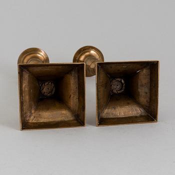 A PAIR OF BRONZE CANDLESTICKS, 19th century.