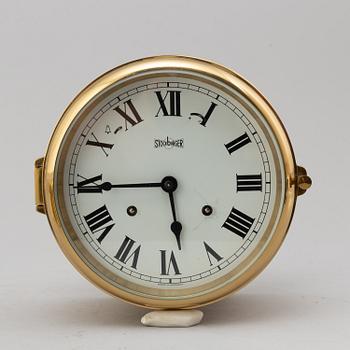 A BRASS MARINE CLOCK AND BAROMETER BY STOCKBURGER.