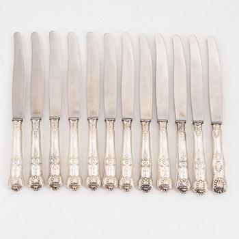 Twelve Swedish silver table knives, most with mark of Jakob S Lundberg, Stockholm 1845.