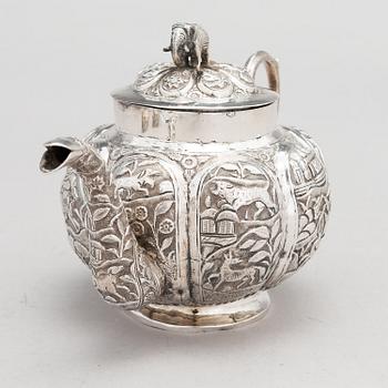 A 3-piece Asian silver tea set, presumably from the mid-20th century.