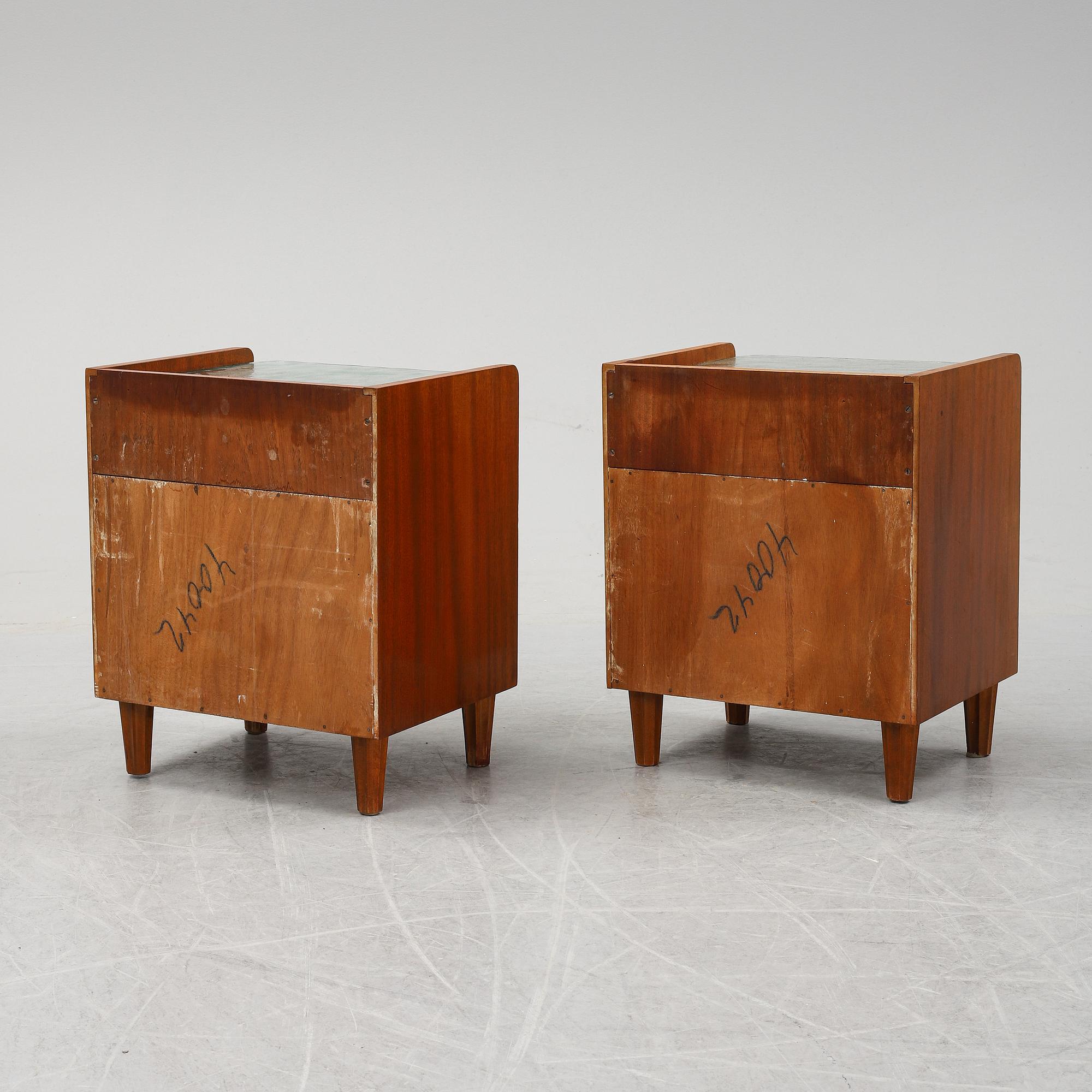 A pair of mahogany bedside tables, mid 20th Century.