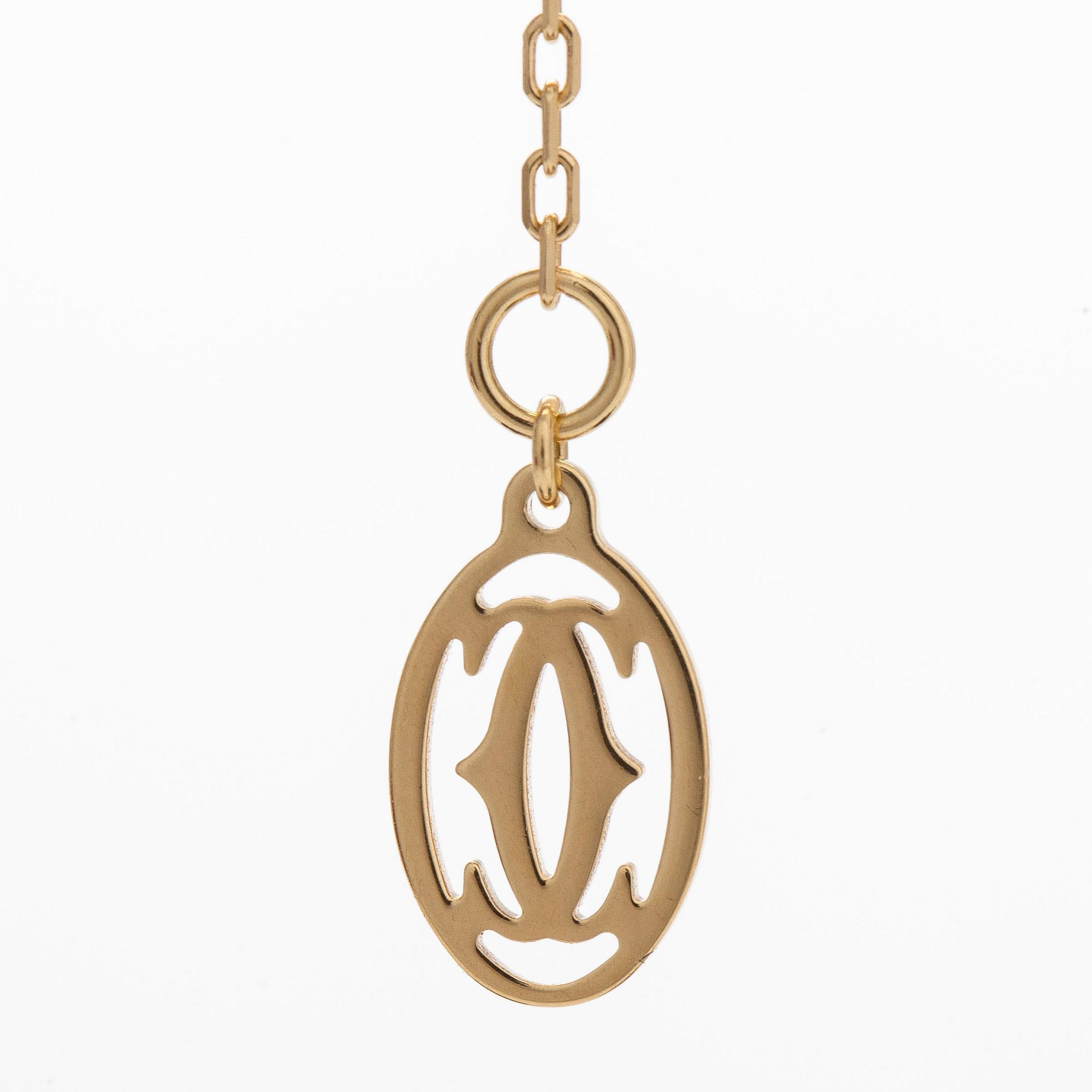 Cartier, an 18K gold 'd'Amour' necklace, with a ca 0.05 ct brilliant-cut diamond.