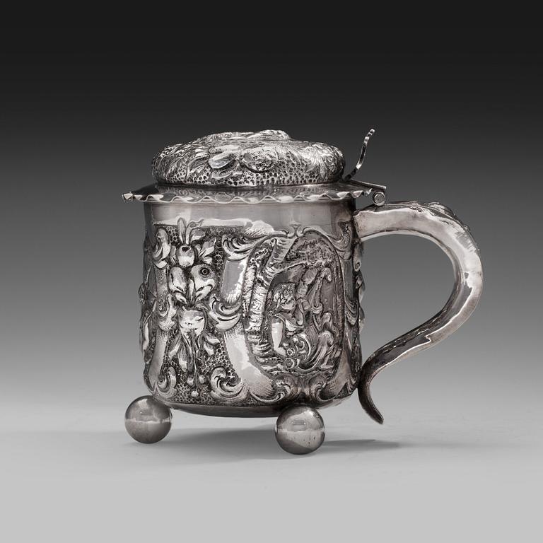 A TANKARD silver. Germany 1800 s. Height 13 cm. Weight 414 g.