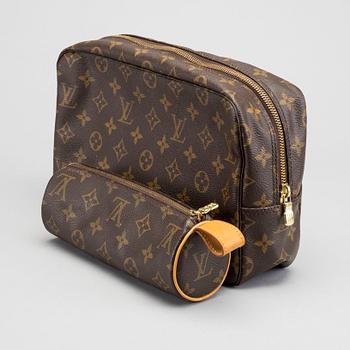 A LOUIS VUITTON TOILET POUCH and PENCIL CASE.