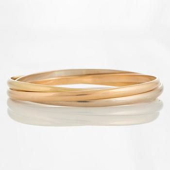 A Cartier "Trinity" bangle.