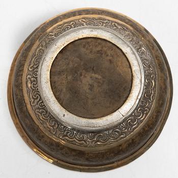 Two Tibetan bowls, low-grade silver and burl-wood, Early 20th century.