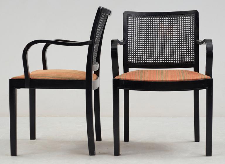 A set of eight Uno Åhrén black lacquered birch chairs and a pair of armchairs, Svenskt Tenn, ca 1931.