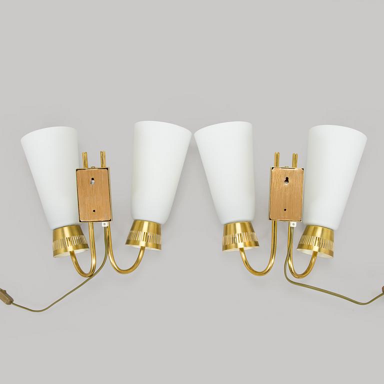 A pair of mid-20th century wall lights, model EY60, Itsu, Finland.