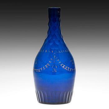 238. A DECANTER. Blue glass, partially cut and gilted decoration. Russia, early 1800s.