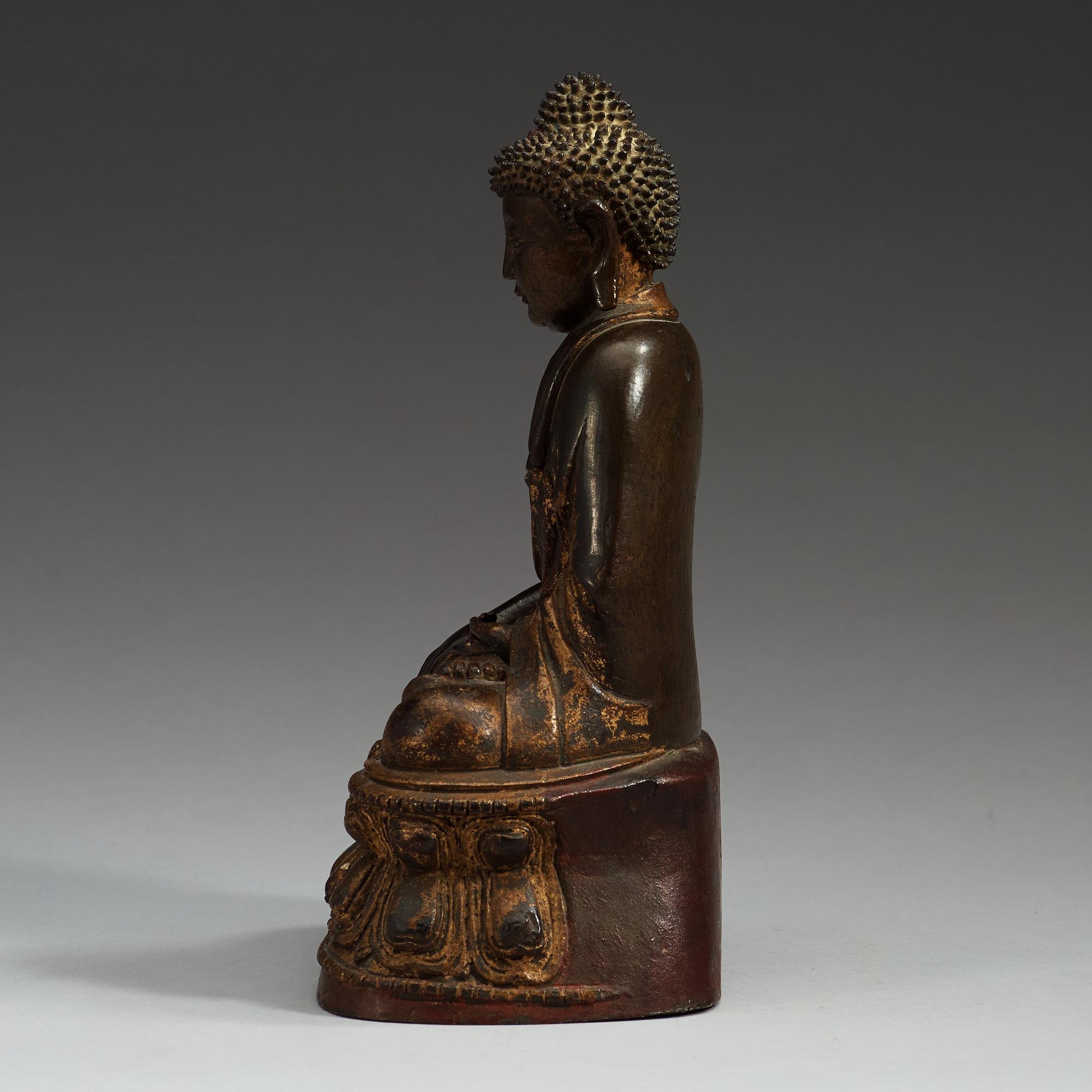 A gilt bronze figure of Buddha Sakyamuni, Ming dynasty (1368-1644).