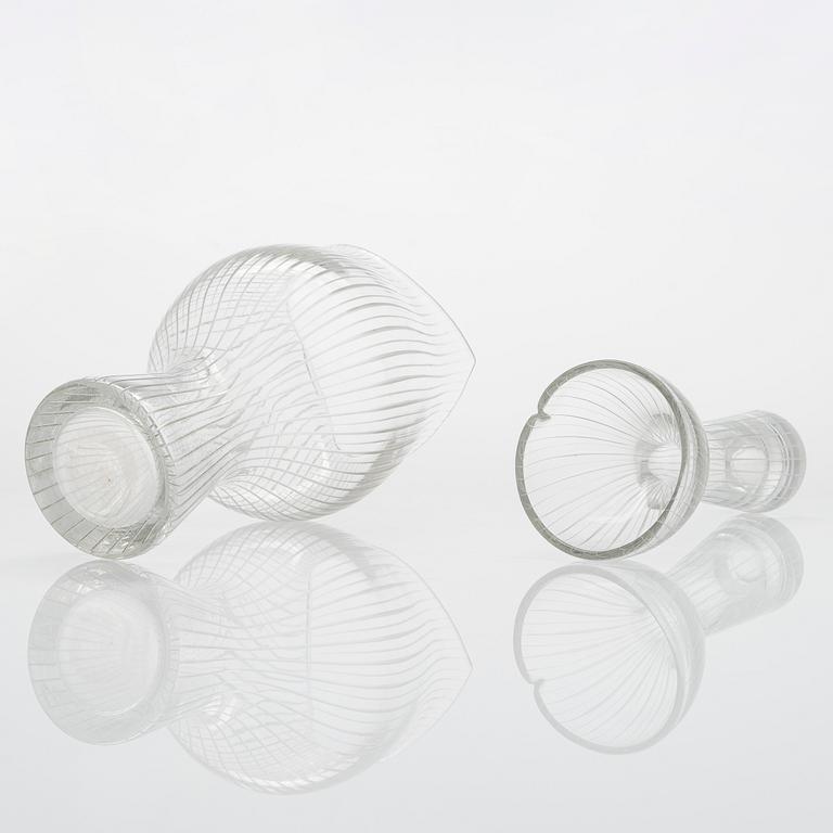 Tapio Wirkkala, four line-cut clear glass vases, signed Tapio Wirkkala Iittala.