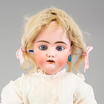 a porcelain doll from the 1920's.