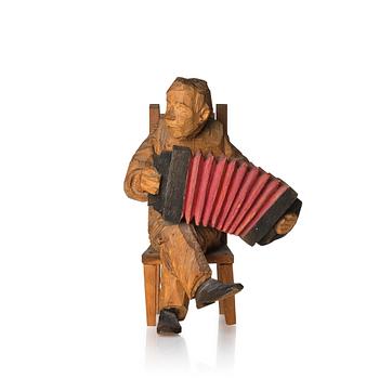 632. Axel Petersson Döderhultarn, Seated Accordionist.