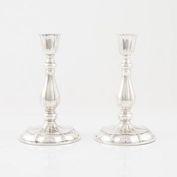 A pair of silver candlesticks, K & EC, Gothenburg, 1959.