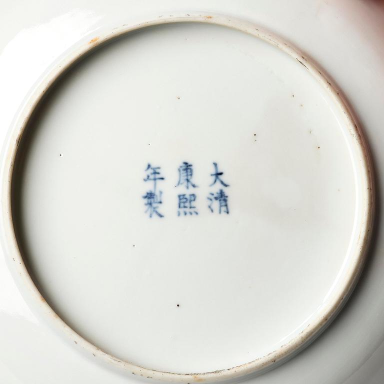 A set of four famille rose floral dishes, Qing dynasty with a apocryphal six character mark.