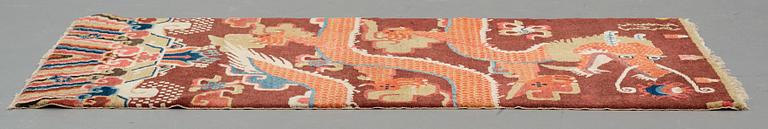 A pillar rug, a semi-antique/an old Chinese, ca 195 x 92,5-93 cm.