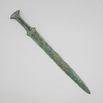 A Luristan bronze sword.