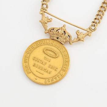 Medal, for diligence and integrity, gold, with a later chain in 18K gold.