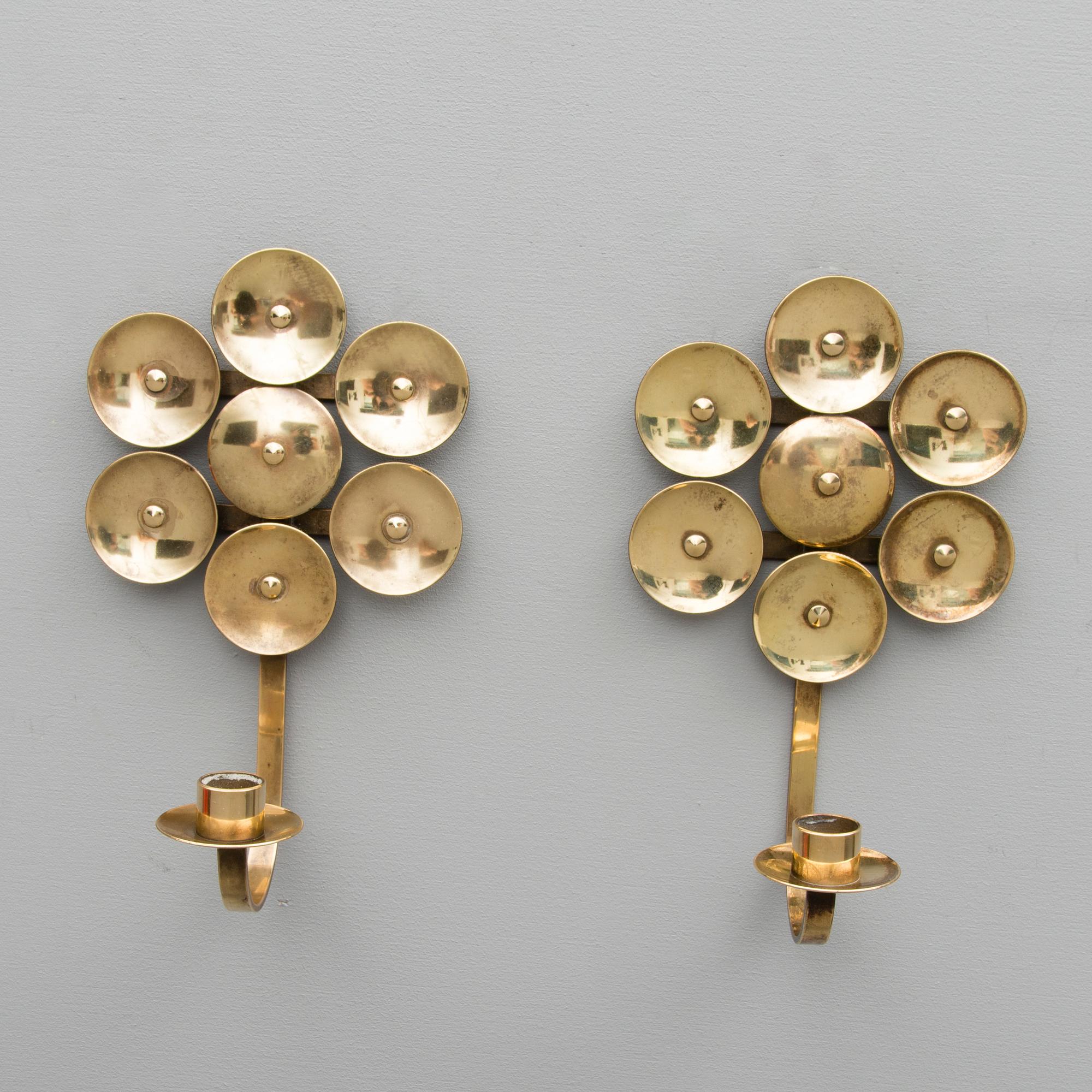 A Pair of Mid Century Swedish Brass Candle Holders by Mora KEE.