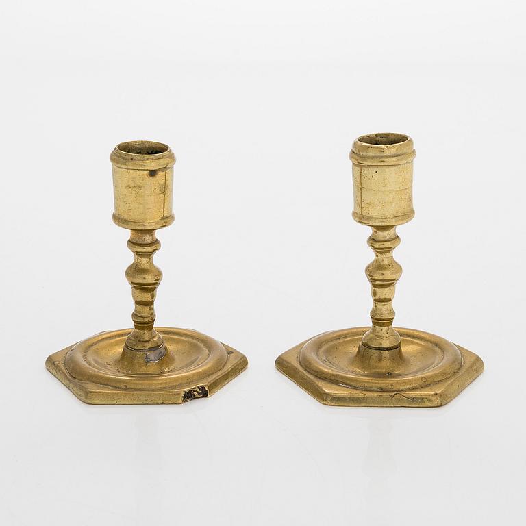 A pair of candle holders, so-called taper sticks, Flanders/Spain, late 17th century.