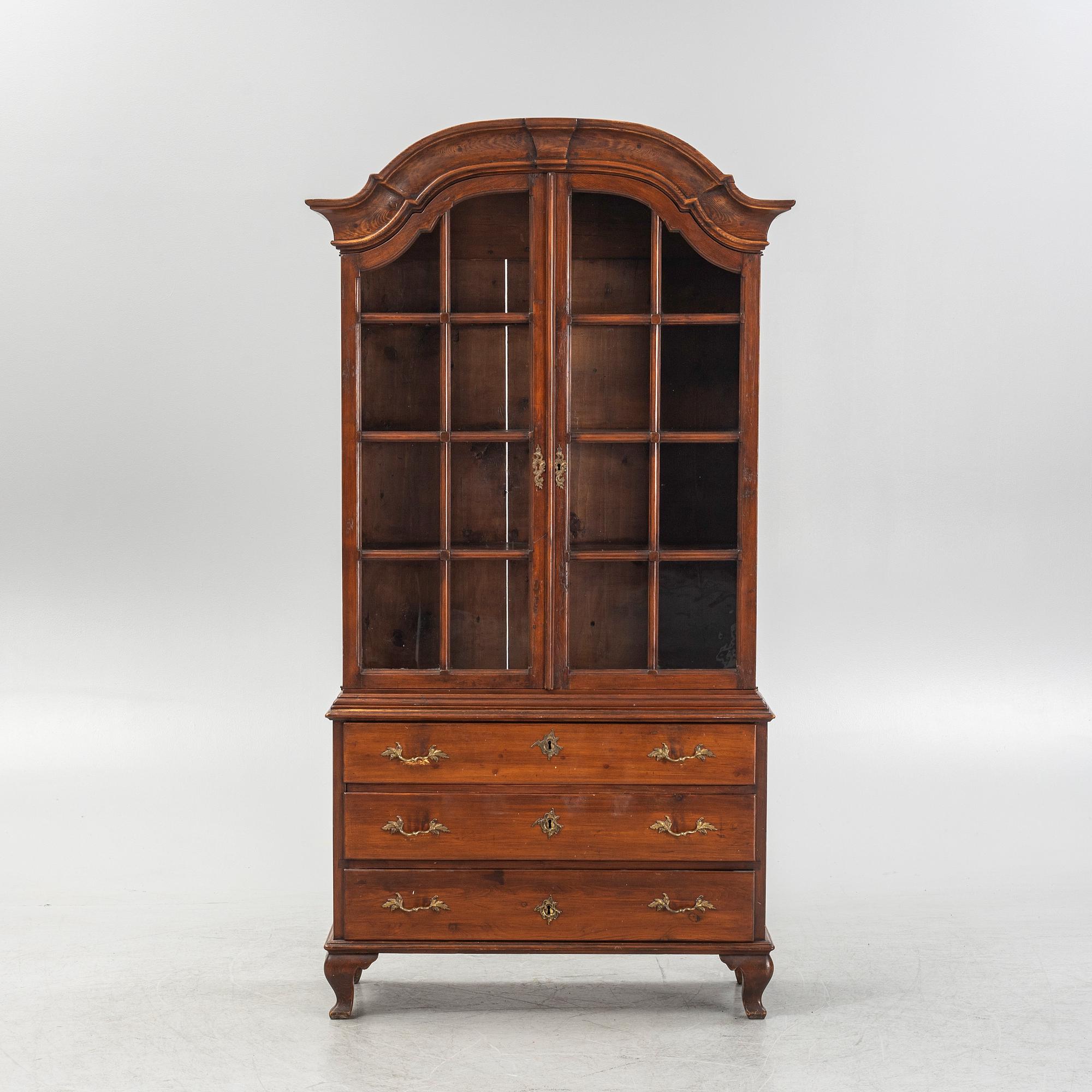 Display cabinet, circa 1900.