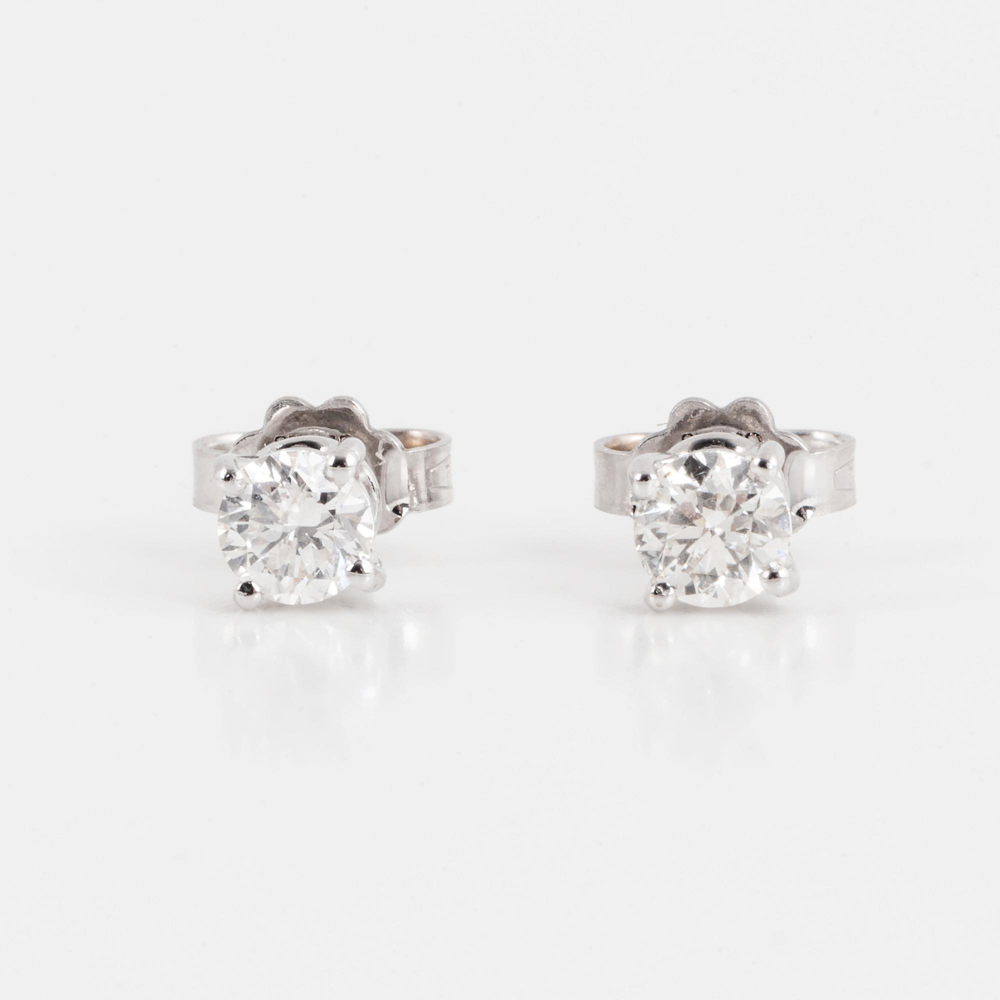 Brilliant-cut diamond earrings.