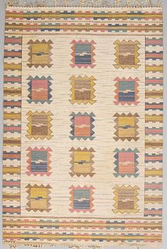 A CARPET. "Ljusa plador". Flat weave. 253 x  170 cm. Signed AB MMF.