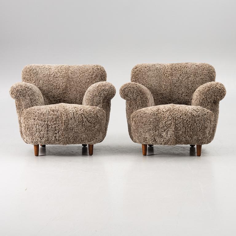 A pair of easy chairs, mid-20th century.