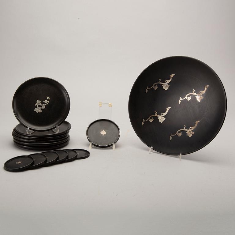 A Swedish 20th century set of 14 plates in bakelite and silver mark of T Wendt Helsingborg 1945.