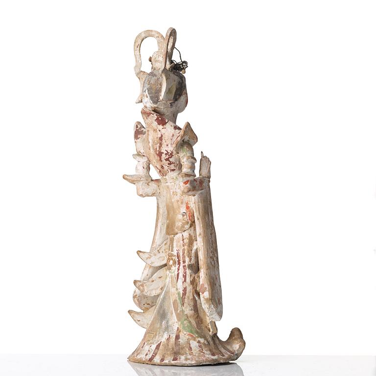 A elegant pottery figure of a court lady, Tang dynasty (618-907).