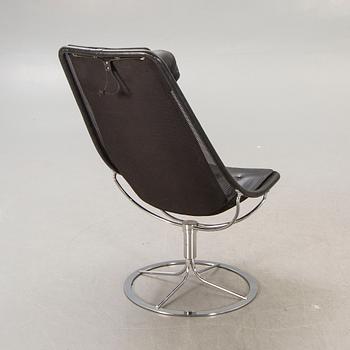 Bruno Mathsson, a Jetson leather and chrome swivel chair later part of the 20th century.