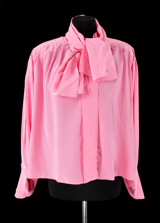 A set of two silk blouses by Yves Saint Laurent.