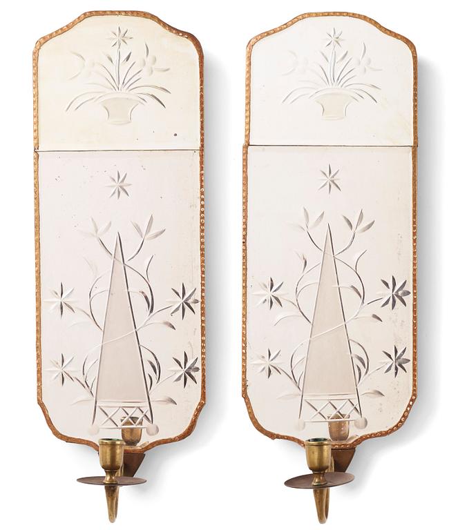 A pair of Gustavian-style giltwood and engraved glass one-light girandole mirrors, circa 1900.