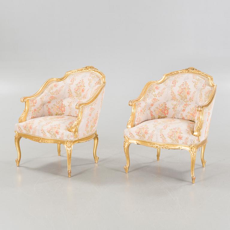 A pair of rococo style bergères, late 19th century.