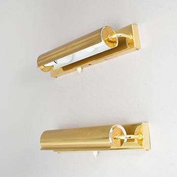 A PAIR OF BRASS WALL LAMPS FROM ÖIA.